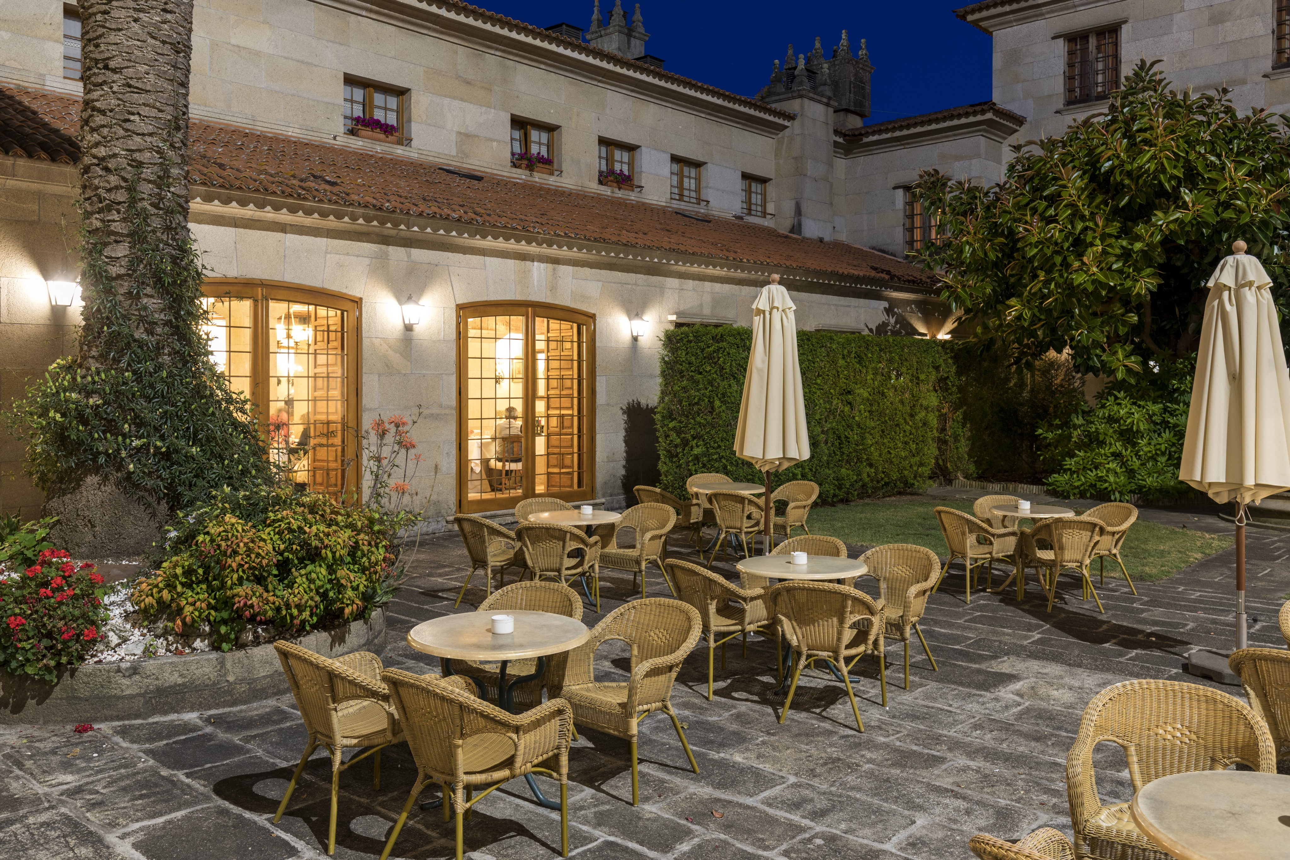 A pear set on a yellow plate upon a soft white canvas texture.