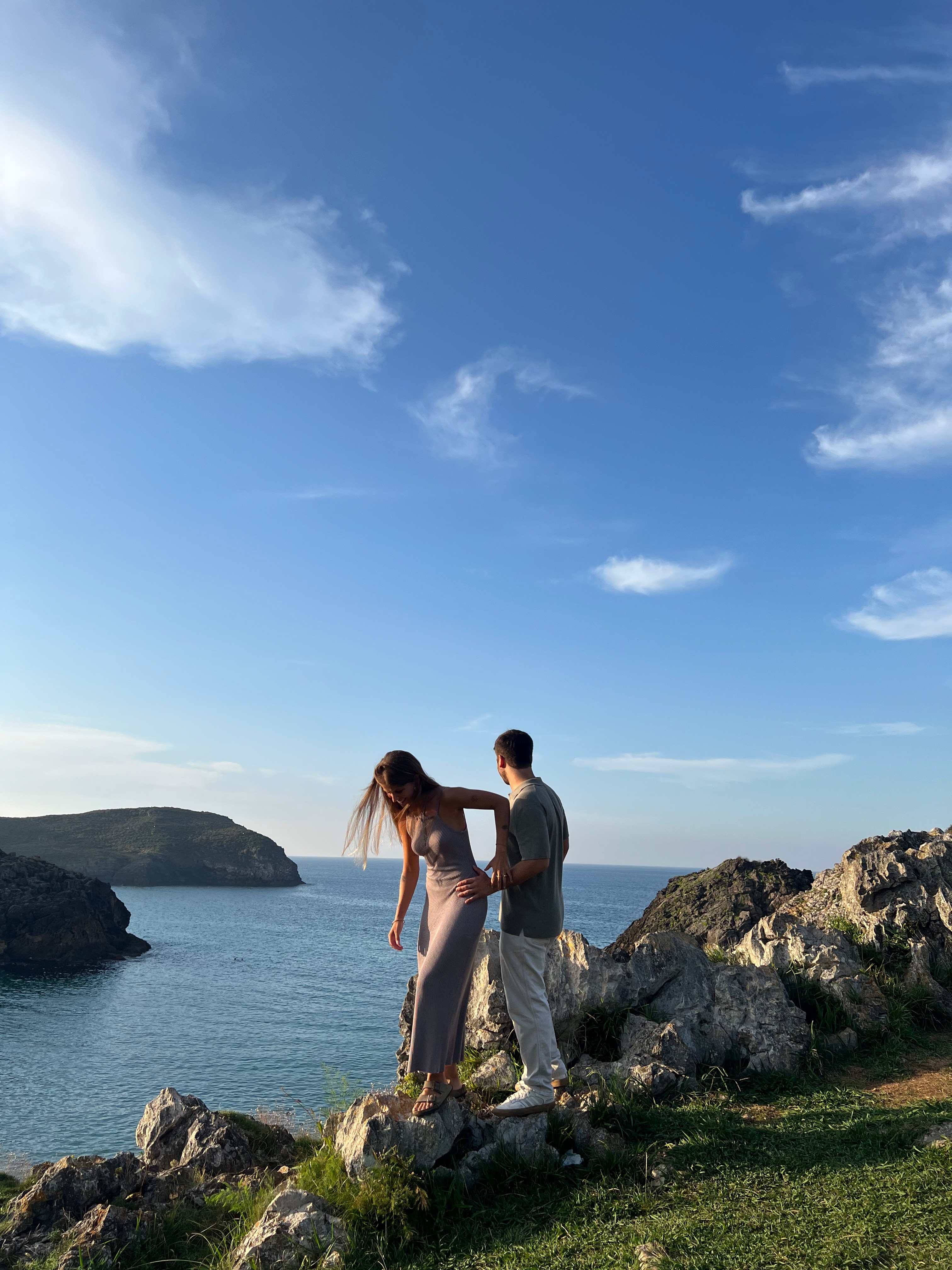 A dried flower rested upon wrinkled pieces of cloth paper.
